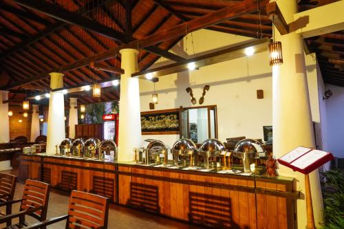 El salón o zona de bar de Hotel Tamarind Tree