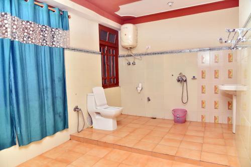 A bathroom at Rufina Blue Pine