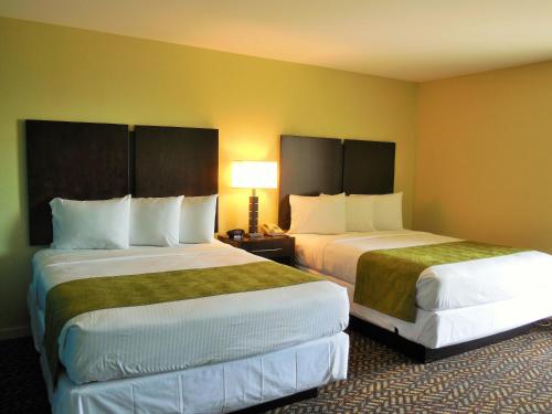 מיטה או מיטות בחדר ב-Anchor Inn