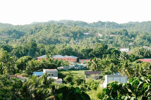 a town in the middle of a mountain at Monte Alto Eco Resort Villas in Villaba