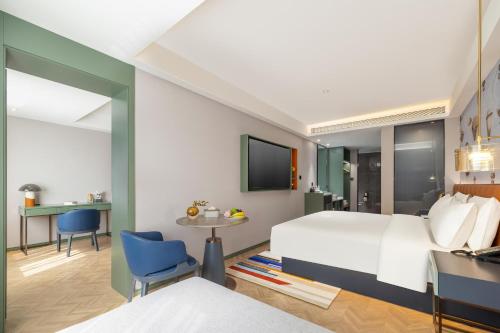 Μια τηλεόραση ή/και κέντρο ψυχαγωγίας στο Atour X Hotel Yulin Changcheng Road Confucius Temple