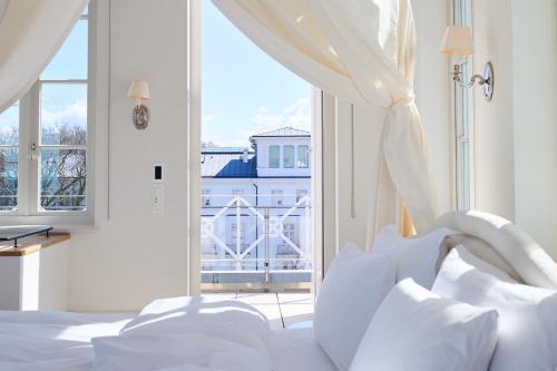 Ein Bett oder Betten in einem Zimmer der Unterkunft Grand Hotel Heiligendamm - The Leading Hotels of the World