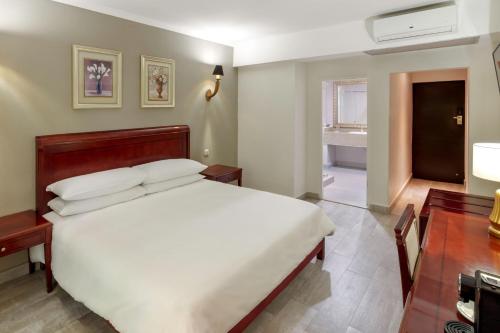 Katil atau katil-katil dalam bilik di Protea Hotel by Marriott Livingstone