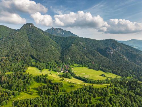 an aerial view of a valley in the mountains at Apartmány pod Rozsutcom - Zaťkov dvor in Terchová