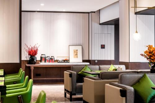 Zona de estar de Hampton by Hilton Hangzhou West Lake