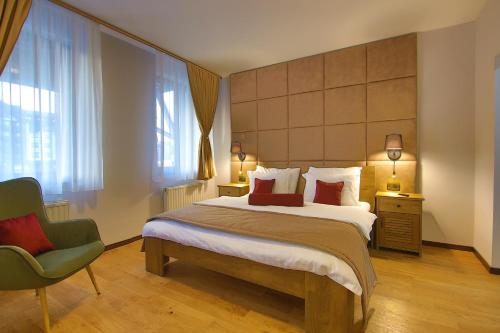 Postel nebo postele na pokoji v ubytování Hotel Olimp