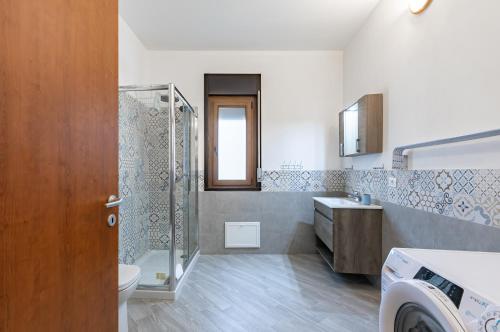 a bathroom with a shower and a toilet and a sink at Teatro Massimo Central Elegant Apartment x5 in Palermo