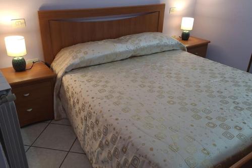 Postel nebo postele na pokoji v ubytování La Rustica mini apartment