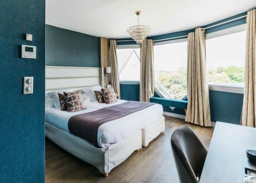 Un ou plusieurs lits dans un hébergement de l'établissement Le Diana Hôtel & Spa