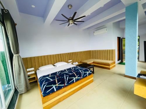Postel nebo postele na pokoji v ubytování hotel saptarang residency panhala