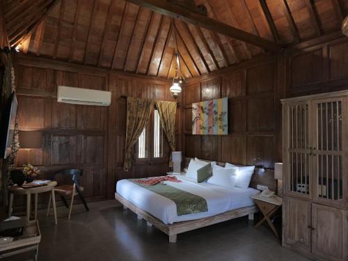 Postel nebo postele na pokoji v ubytování Amata Borobudur Resort