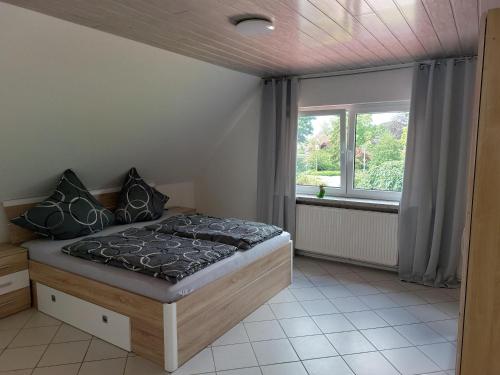 Katil atau katil-katil dalam bilik di Wruck,Ferienwohnung