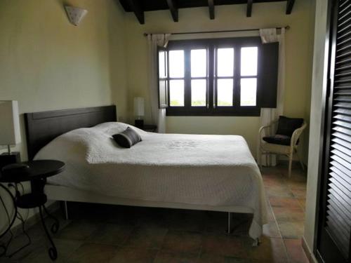 Ένα ή περισσότερα κρεβάτια σε δωμάτιο στο HL 001 Holiday rentals 3 Bedrooms 2 Bathroom