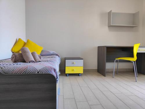 Una cama o camas en una habitación de Siracusa Suite, AC + Wi-Fi + Free Private Parking