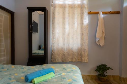Basant Hritu Homestayにあるベッド
