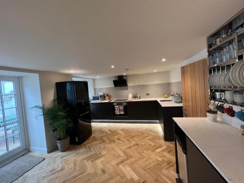 Kuchyň nebo kuchyňský kout v ubytování WM Garden Cottage