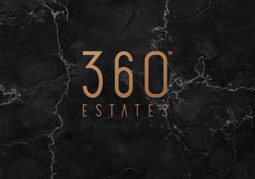 a sign with the number in gold on a wall at Luxury beautiful penthouse with amazing views & AC by 360 Estates in Marsaxlokk