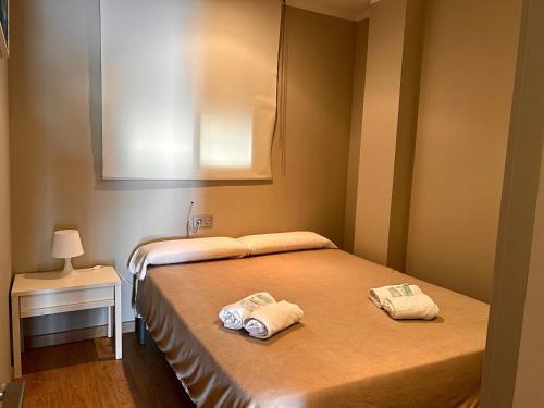 Ένα ή περισσότερα κρεβάτια σε δωμάτιο στο El Coso