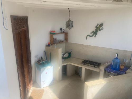 Kuchyň nebo kuchyňský kout v ubytování Gecko House