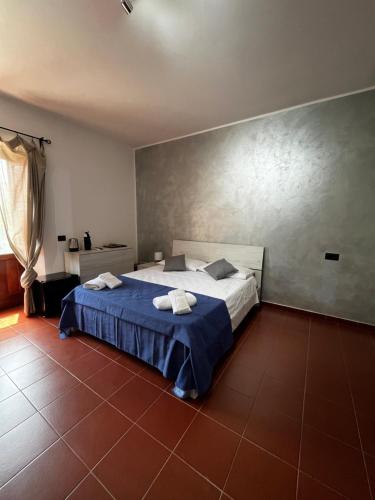 Posteľ alebo postele v izbe v ubytovaní Il Quadrifoglio B&B