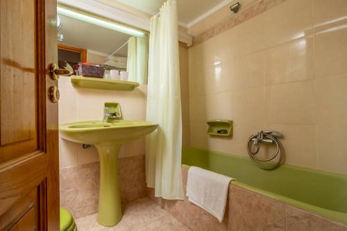 Koupelna v ubytování Hotel Elman