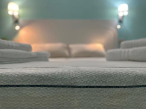 a close up of a bed in a room at B&B -Di Piazza Cairoli in Pisa