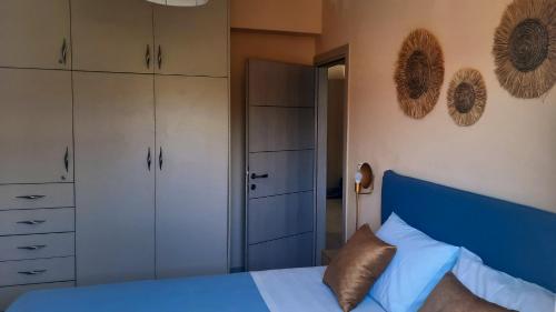 Postel nebo postele na pokoji v ubytování Elena Apartments