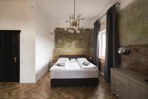 Katil atau katil-katil dalam bilik di Apartments JustLvivIt at the Rynok Square
