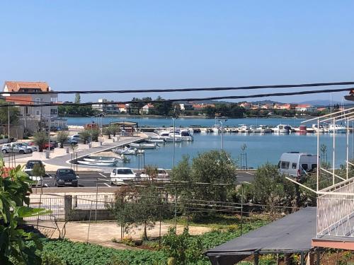 a view of a marina with boats in the water at Apartment Vlado in Sukošan