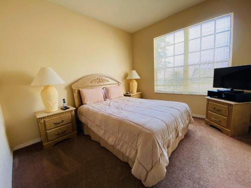 Una cama o camas en una habitación de Great Escapes at Southern Dunes