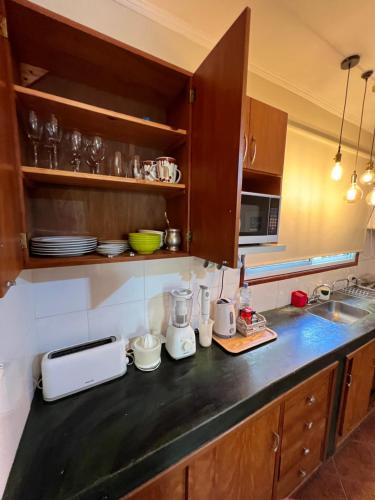 Køkken eller tekøkken på Flora Apartments