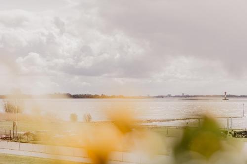 a view of a large body of water at Fährhaus Kollmar in Kollmar