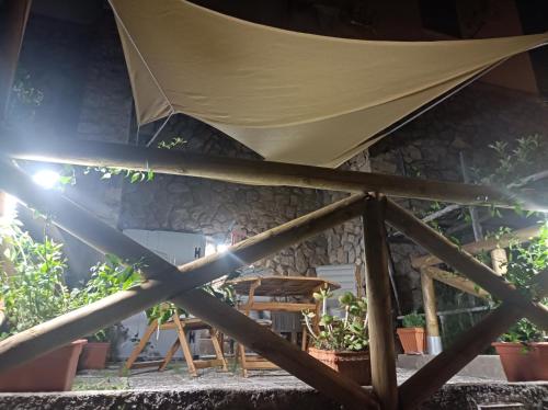 a tent in front of a building with plants at Turchese in Amalfi