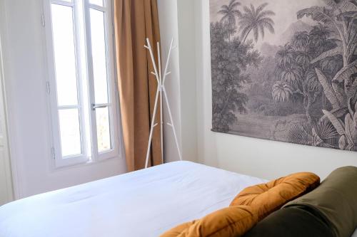 Posteľ alebo postele v izbe v ubytovaní Villa Adèle, Sauna et Balcon vue Mer - Appt 03