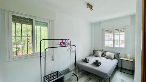 En eller flere senge i et værelse på Casa Sol & Mar, Rincon de la Victoria, Malaga