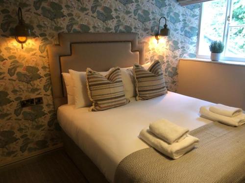 Ein Bett oder Betten in einem Zimmer der Unterkunft Alvanley Arms, Cotebrook