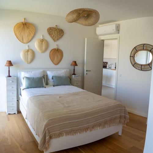 2BR Apt w- Private Garden, Pool, Gym & Parking