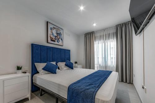 מיטה או מיטות בחדר ב-Luxury 2bedroom apartment on San Juan Beach