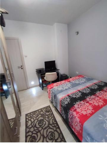 Postel nebo postele na pokoji v ubytování Nikolaj