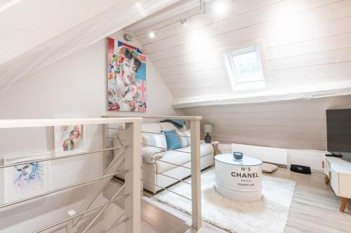 En eller flere senge i et værelse på K2 Annecy Rent Lodge duplex de deux chambres doubles entièrement rénové