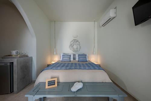 Cama o camas de una habitación en Blue Dolphins Apartments