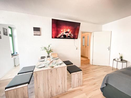 Posezení v ubytování Zentrales Apartment mit TV, Küche und Mikrowelle