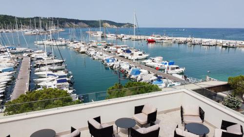 a view of a marina with boats in the water at Dolcemente Garni Hotel Superior in Izola