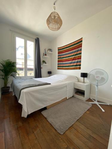 SUPER APPARTEMENT AU COEUR DE MONTMARTRE