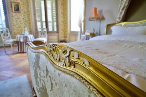 Кровать или кровати в номере Chateau les Villettes