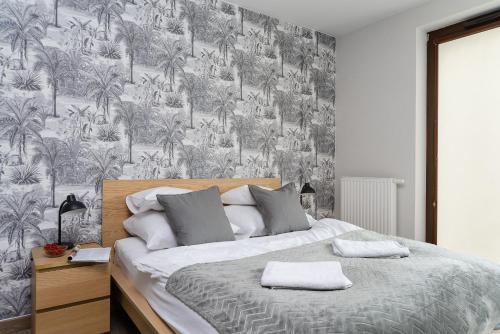 Posteľ alebo postele v izbe v ubytovaní P&O Serviced Apartments Siedmiogrodzka III