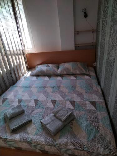 Postel nebo postele na pokoji v ubytování 2K Apartment