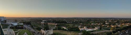 an aerial view of a city at sunset at Balcone in Valle d'Itria in Martina Franca