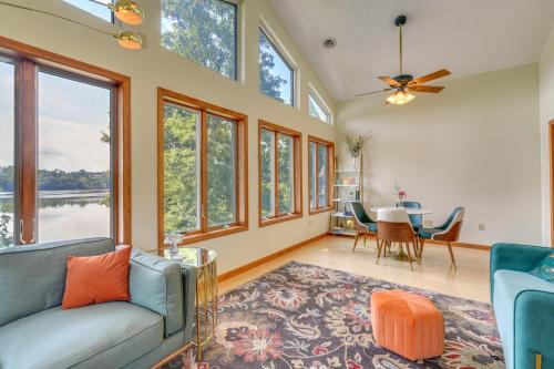 a living room with a couch and a table at Waterfront Bristol Area Retreat with Boat Dock in Blountville