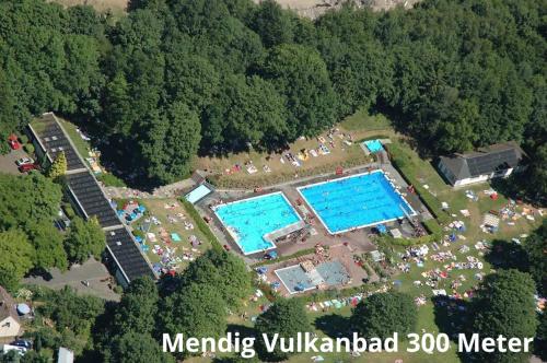 an overhead view of a swimming park with two pools at Basaltikum in Mendig